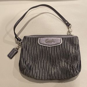 brand new Coach wristlet satin bag with strap
